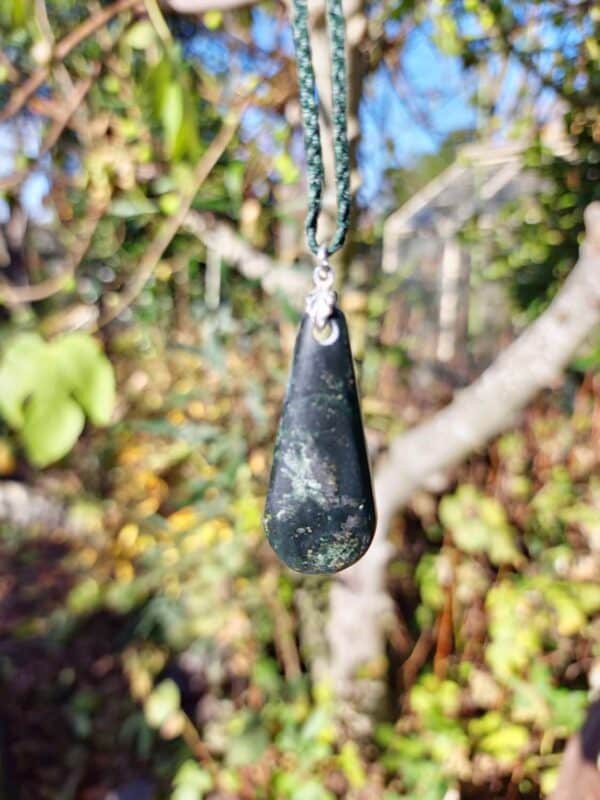 PAU13 Emerald Green Tangiwai Roimata with clasp, pounamu, taonga (2) PAU13 Emerald Green Tangiwai Roimata with clasp, pounamu, taonga (2)