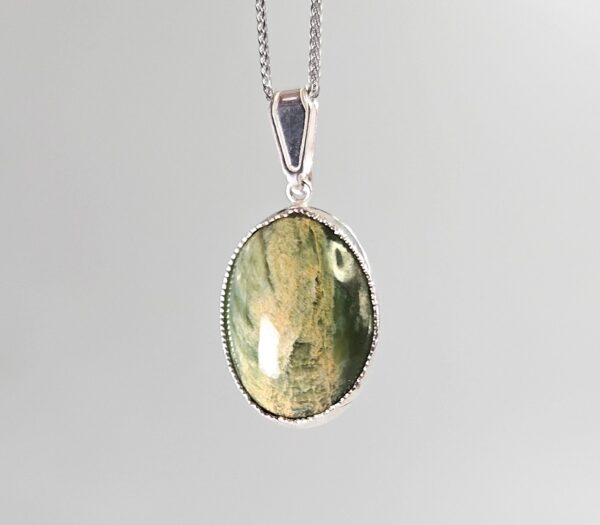 Pendant, silver, pounamu, flower jade, taonga. (2)